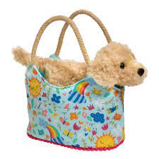 Peluche Labrador brun dans un sac